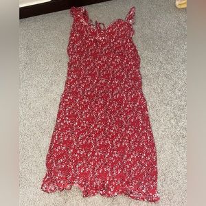 Red/pink dress with flowers.